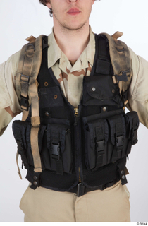 Reece Bates Contractor A pose 1 army vest backpack upper…